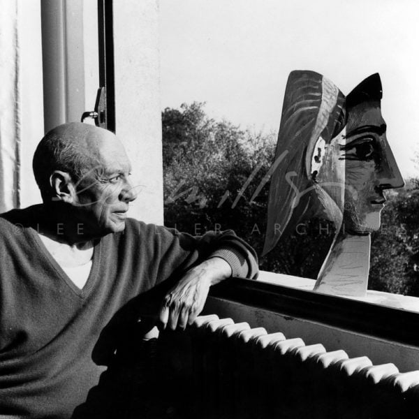 Picasso with metal sculpture of Jacqueline Roque
